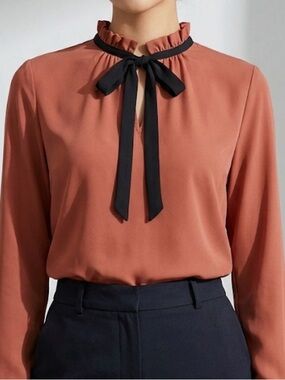 Active USA Rust Ruffle Tie-Neck Blouse with Black Bow